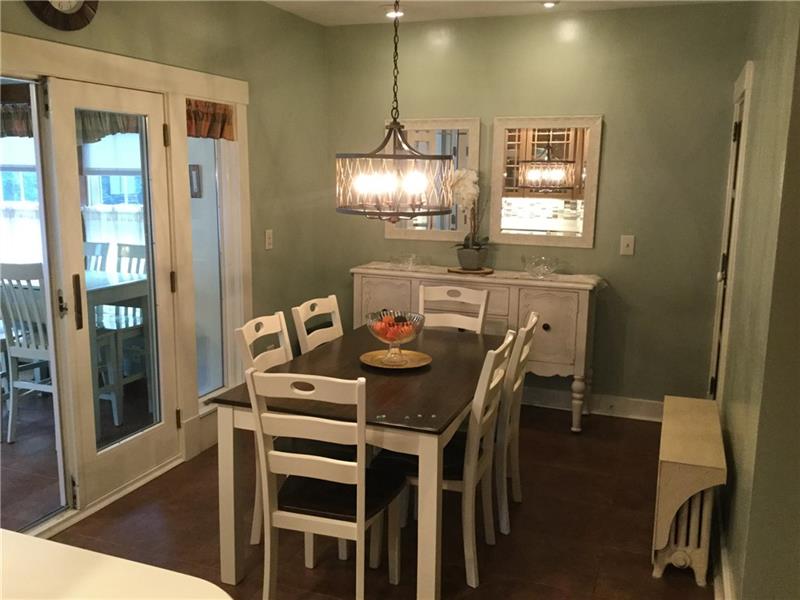 1058 Highland Road Sharon, PA 16146 - Photo 9 of 25 EAT-IN KITCHEN LEADS TO THE SUNROOM.