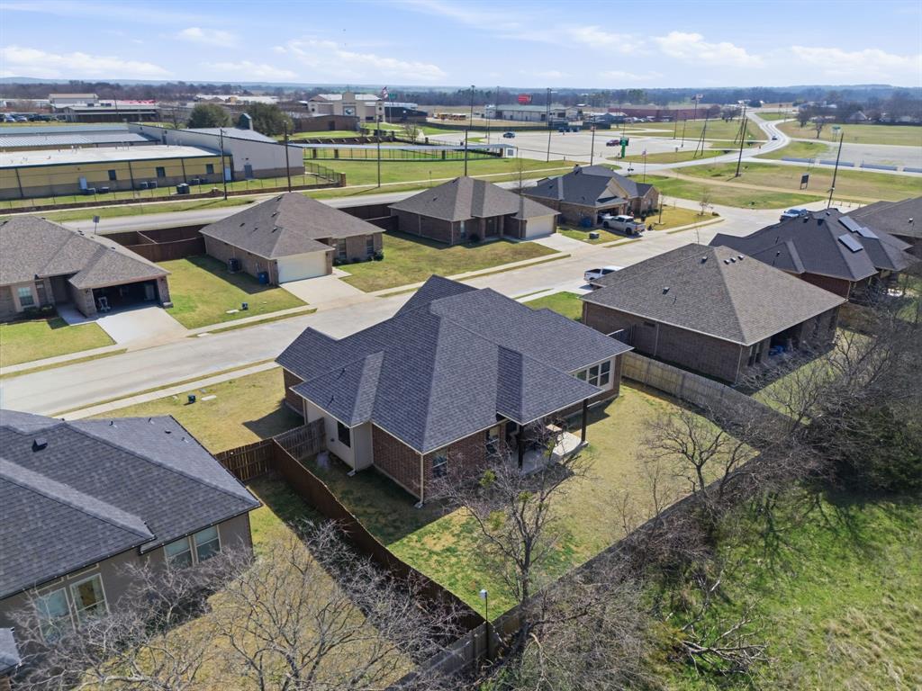 711 Hadley Lane Valley View, TX 76272 - Photo 38 of 40 Aerial view of residential area