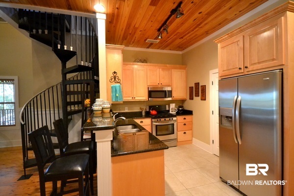 32700 Steelwood Ridge Road, Unit B Loxley, AL 36551 - Photo 5 of 25 Spiral staircase that leads to the loft.