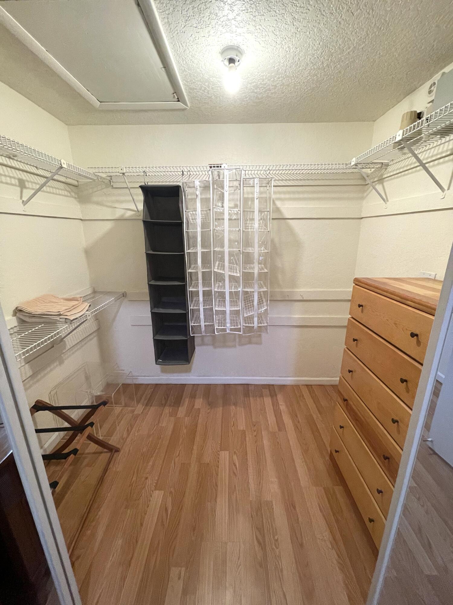 6508 Via Regina, Unit 4 Boca Raton, FL 33433 - Photo 12 of 22 12- Primary Walk-in Closet