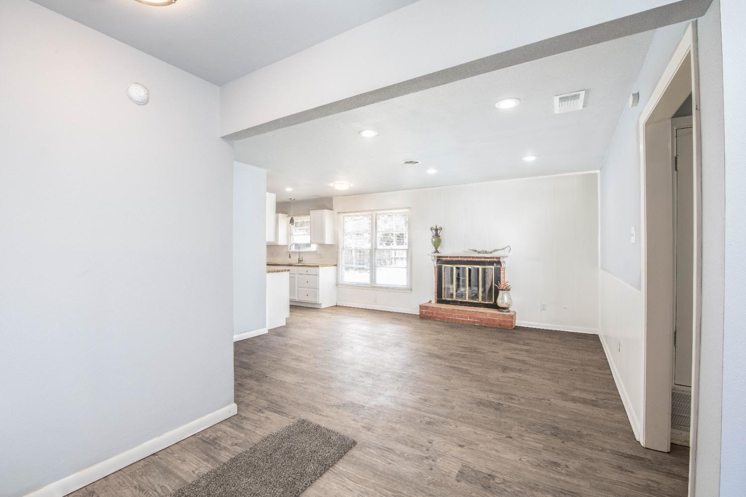 5116 47th Street Lubbock, TX 79414 - Photo 3 of 20 a view of an empty room with a window