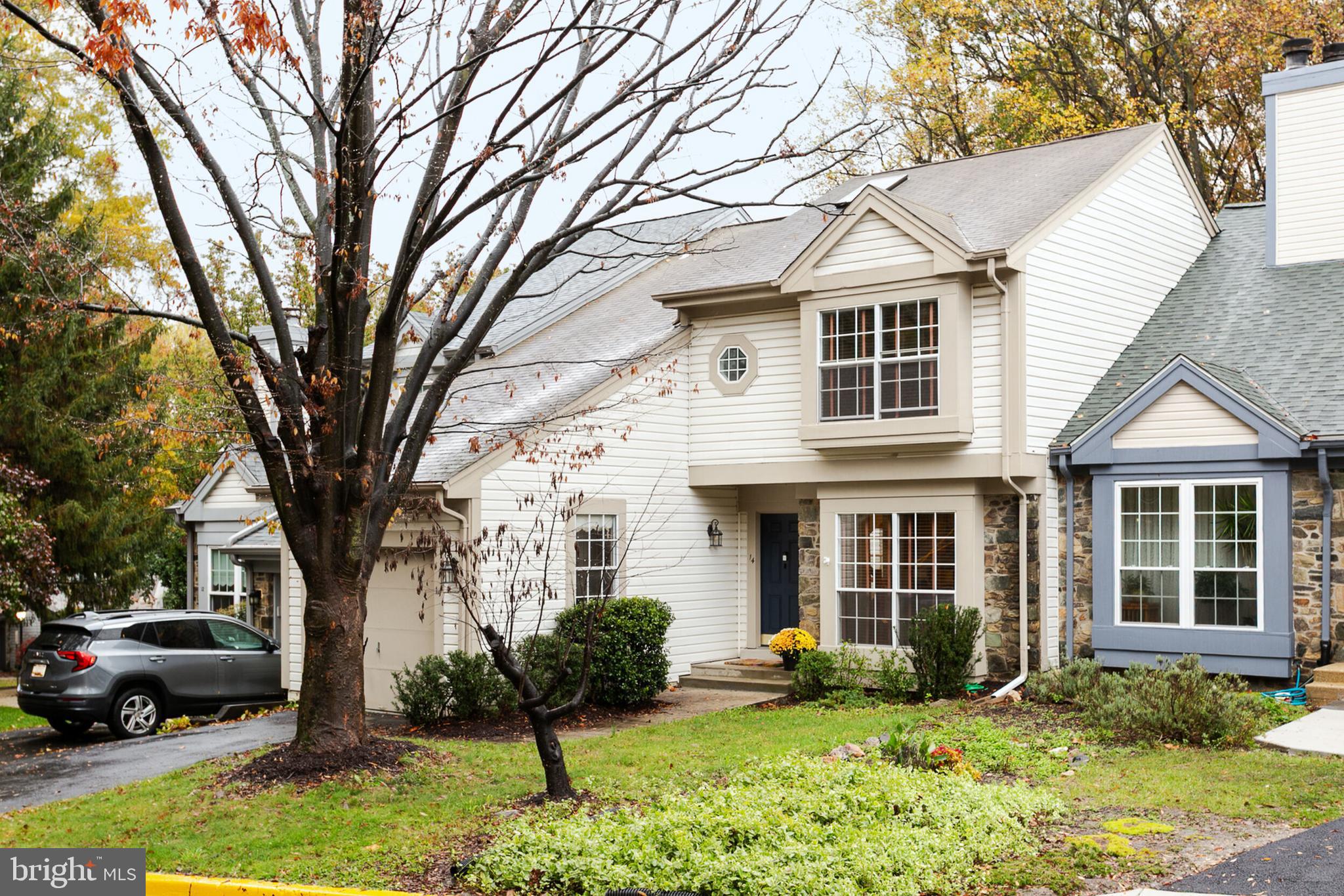 14 Tivoli Lake Court Silver Spring, MD 20906 - Photo 1 of 20 a front view of a house with garden