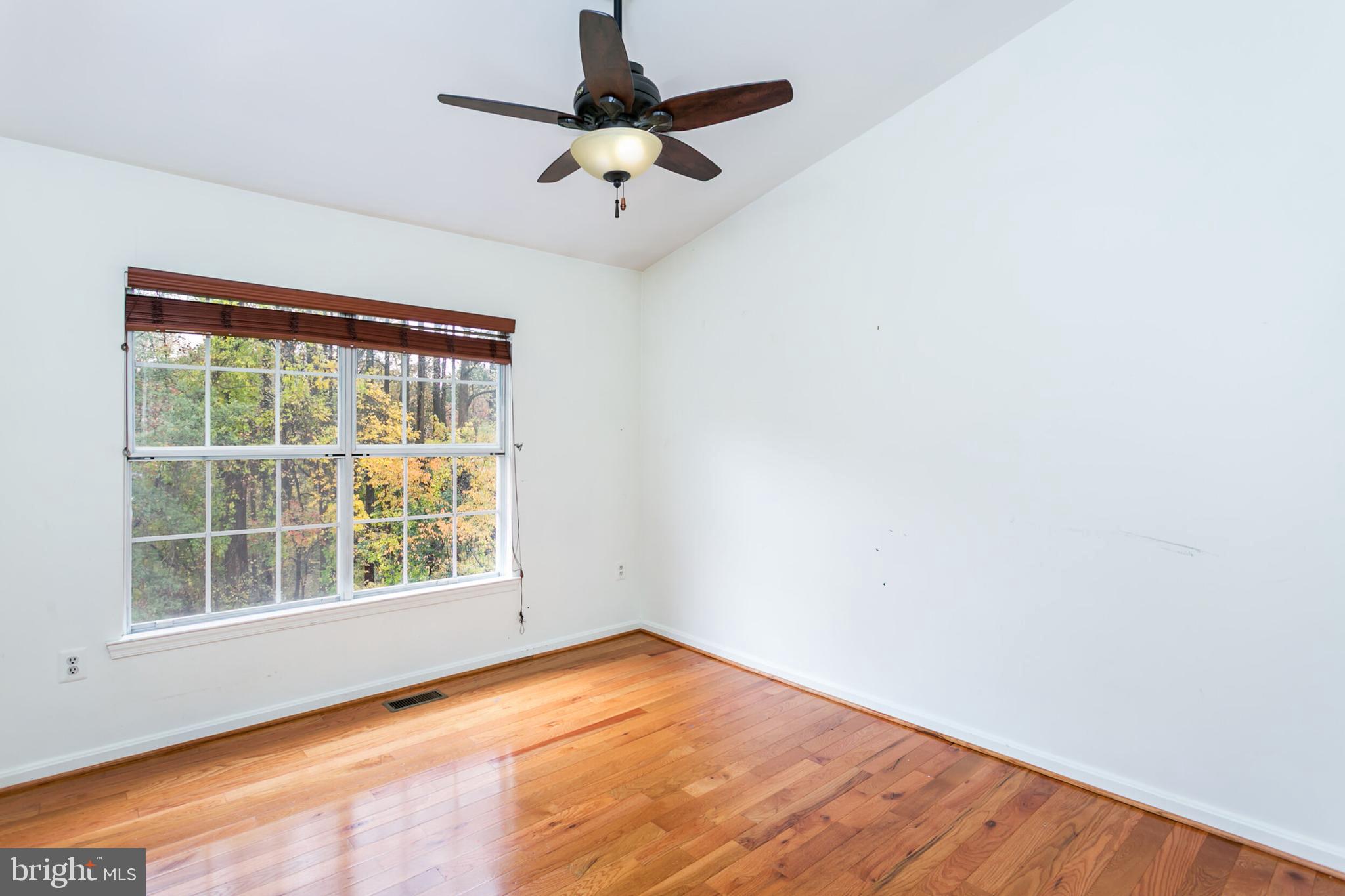 14 Tivoli Lake Court Silver Spring, MD 20906 - Photo 13 of 20 an empty room with a window