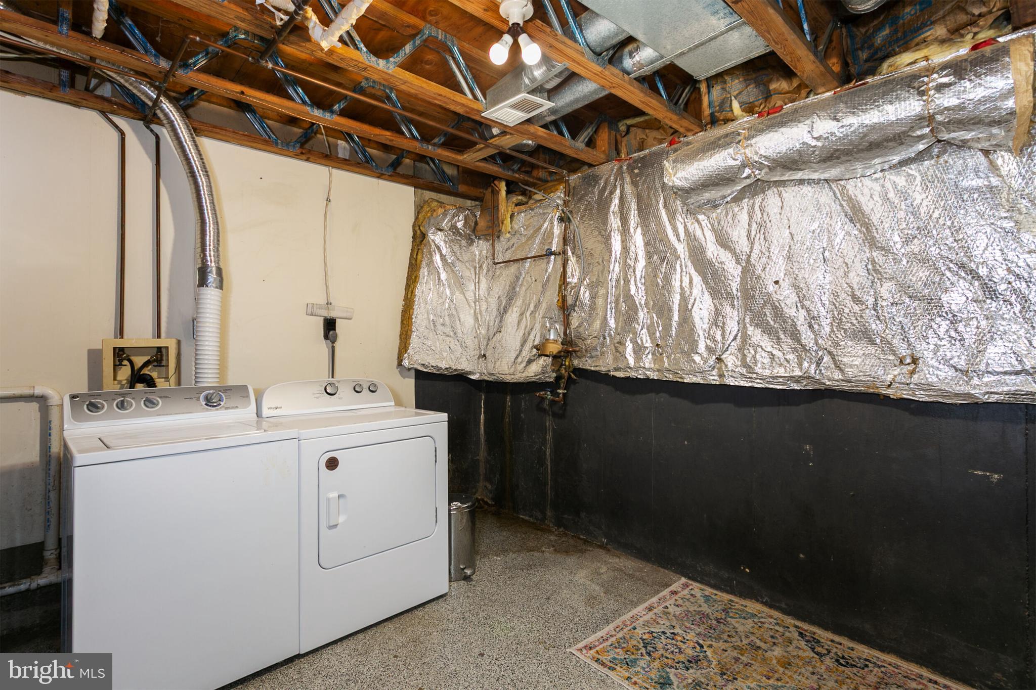 14 Tivoli Lake Court Silver Spring, MD 20906 - Photo 16 of 20 a utility room with a washer and dryer