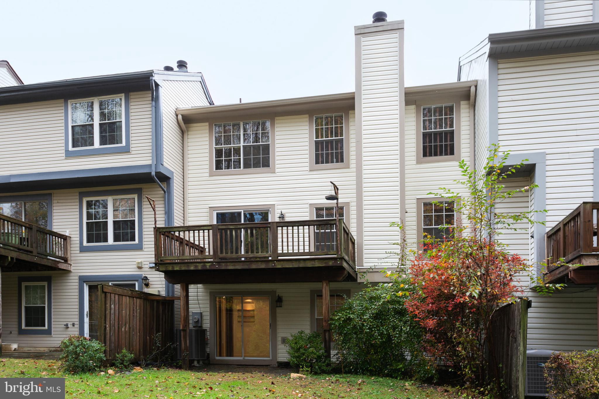 14 Tivoli Lake Court Silver Spring, MD 20906 - Photo 20 of 20 a front view of a house with a garden