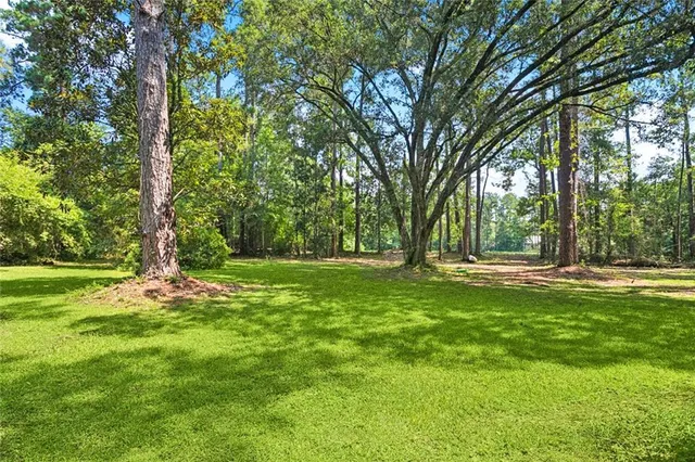 $545,000 | 233 Robin Hood Drive, Covington, LA 70433