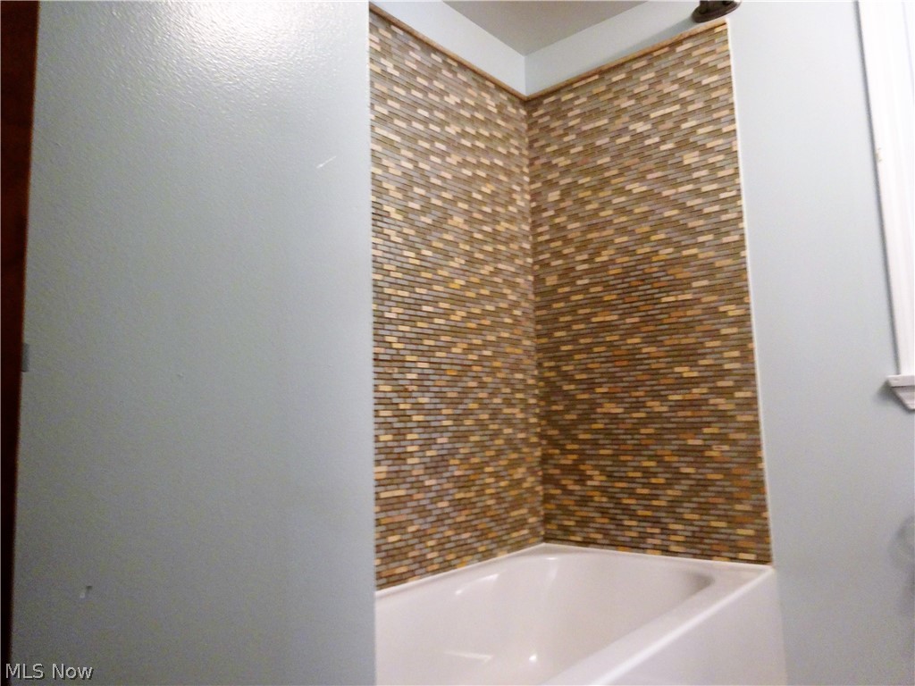 3940 West Sprague Road Parma, OH 44134 - Photo 9 of 34 Main floor bathroom shower