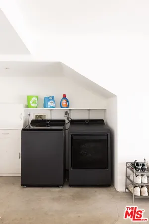 a kitchen with a stove and a cabinet