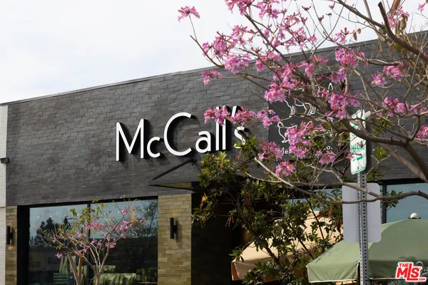 a view of a shop in a street