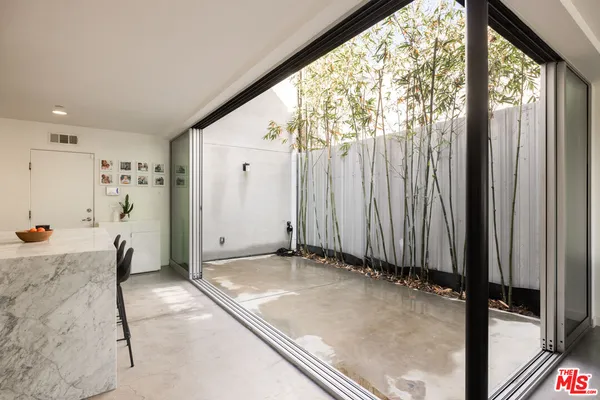 a view of a room with a large window