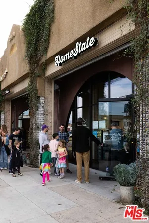a view of a street with cars