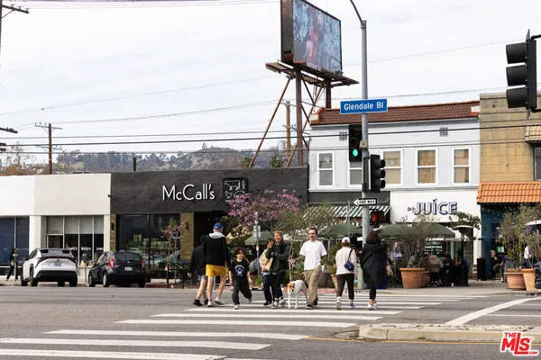 a view of street with sitting area