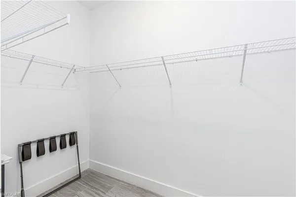 a view of a room with racks on the wall