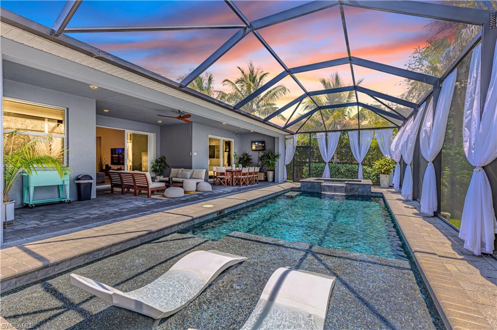 27180 Williams Road Bonita Springs, FL 34135 - Photo 2 of 42 a view of an chairs and table in the patio