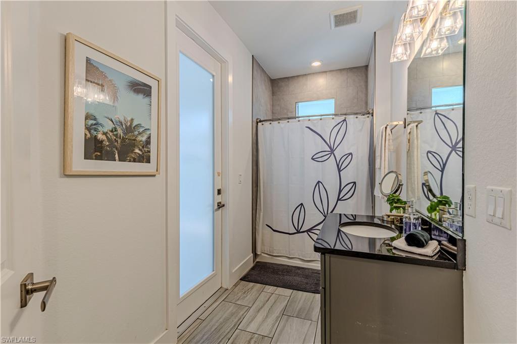 27180 Williams Road Bonita Springs, FL 34135 - Photo 24 of 42 a view of a entryway with furniture and wooden floor