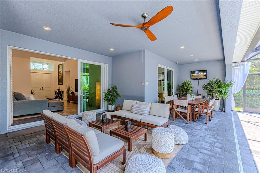 27180 Williams Road Bonita Springs, FL 34135 - Photo 30 of 42 a living room with furniture and a large window