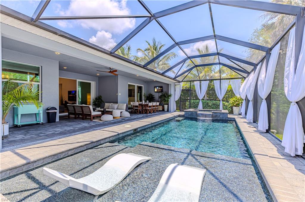 27180 Williams Road Bonita Springs, FL 34135 - Photo 32 of 42 a view of an chairs and table in the patio