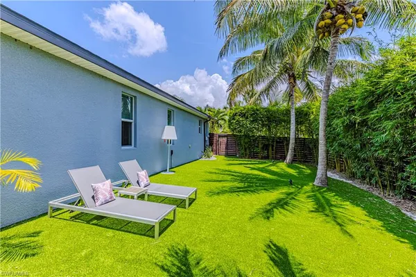 a view of a backyard with a patio