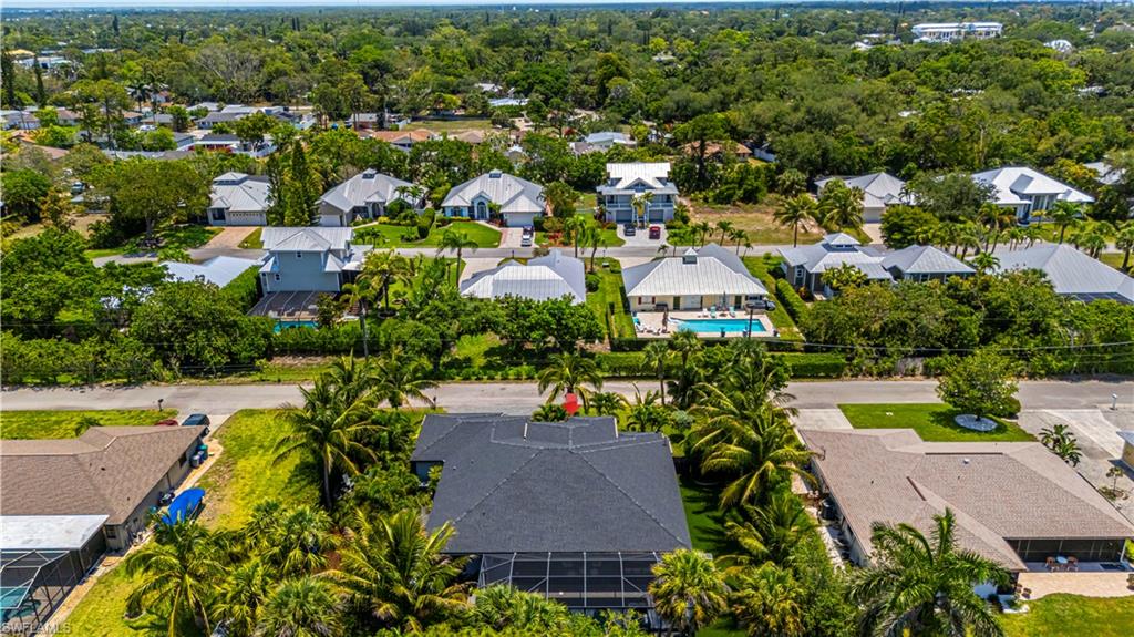 27180 Williams Road Bonita Springs, FL 34135 - Photo 39 of 42 an aerial view of residential houses with outdoor space and swimming pool