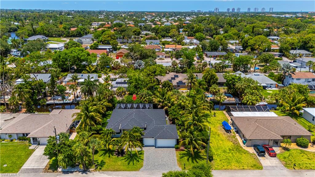 27180 Williams Road Bonita Springs, FL 34135 - Photo 6 of 42 an aerial view of residential houses with outdoor space and trees all around