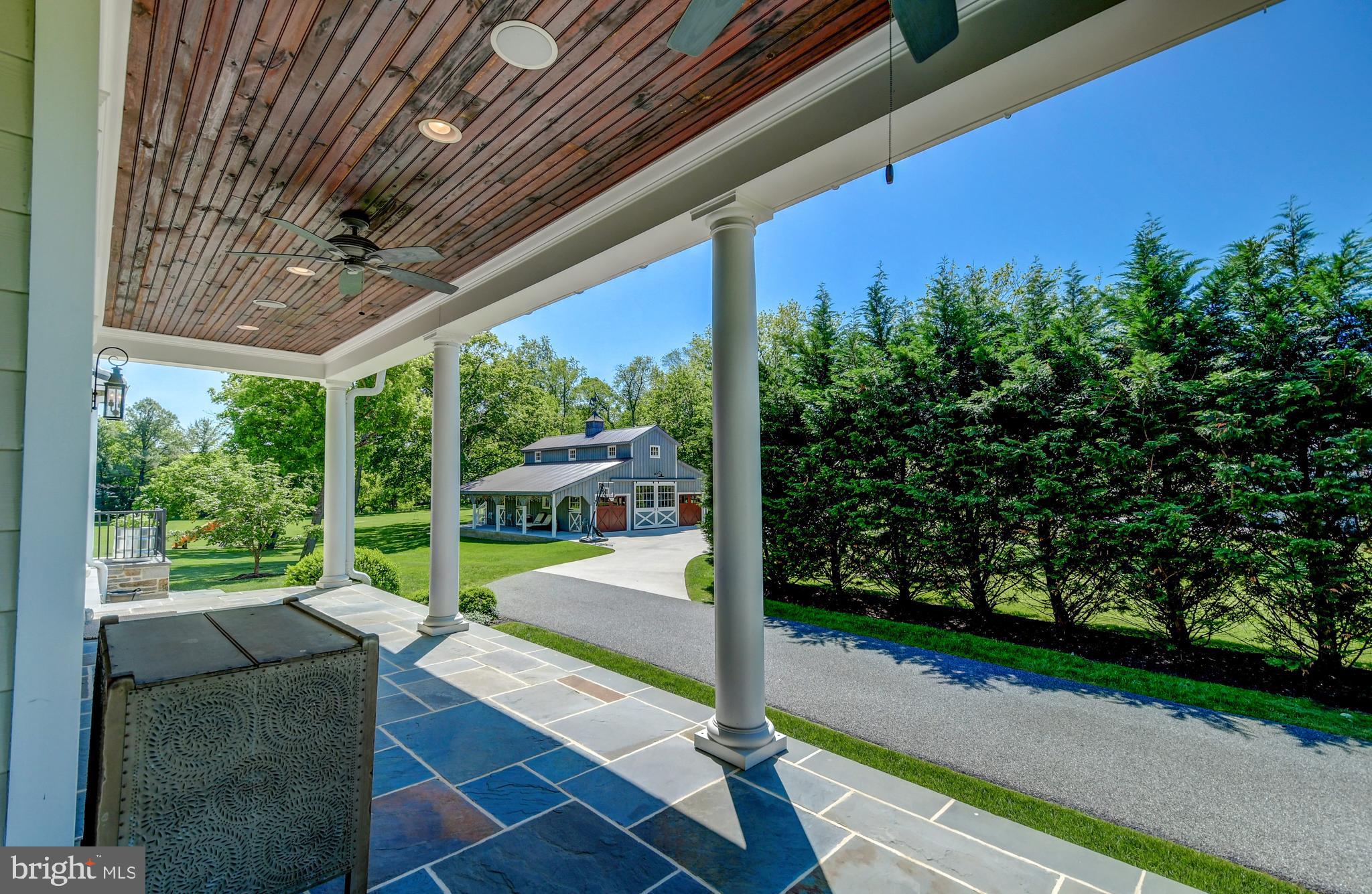 10613 Stevenson Road Stevenson, MD 21153 - Photo 40 of 62 Wrap Around Side Porch