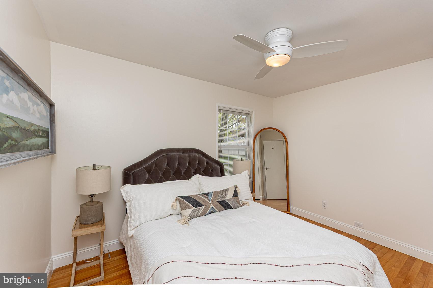 2011 Hanson Road Edgewood, MD 21040 - Photo 15 of 37 a bedroom with a bed and a painting on the wall
