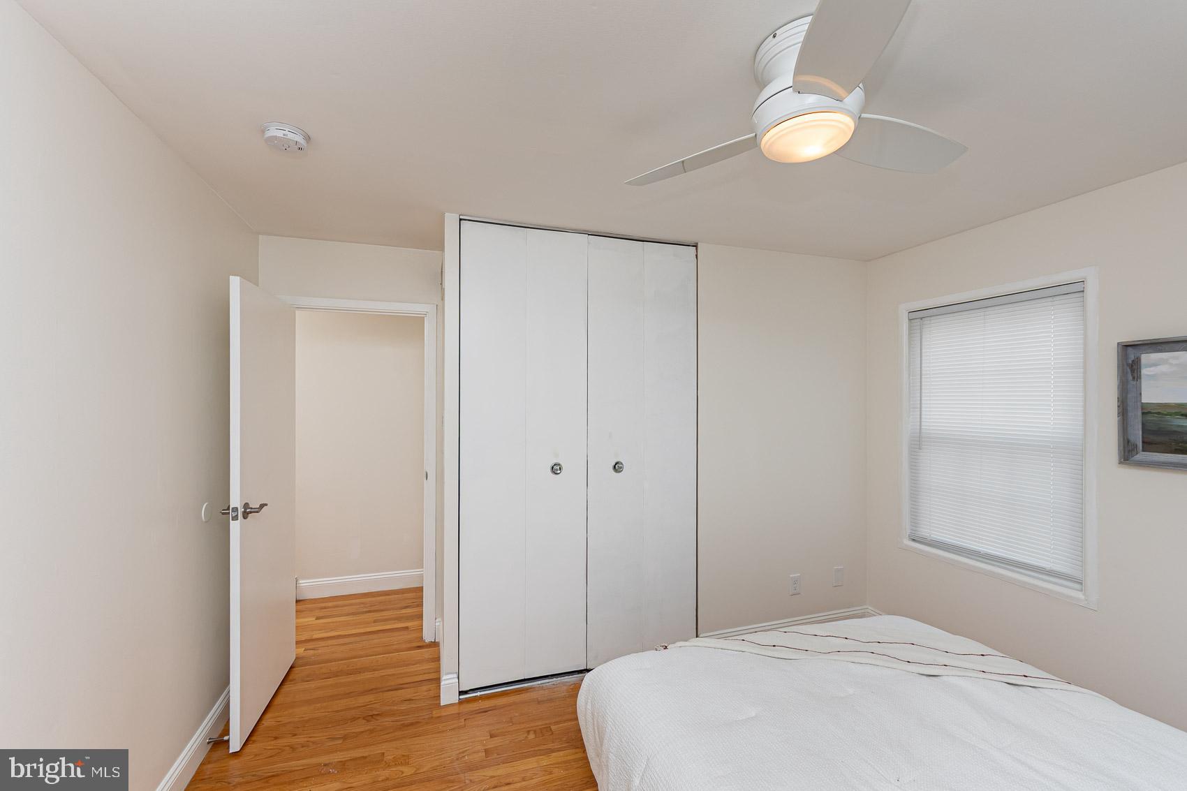 2011 Hanson Road Edgewood, MD 21040 - Photo 17 of 37 a bedroom with a bed and a chandelier