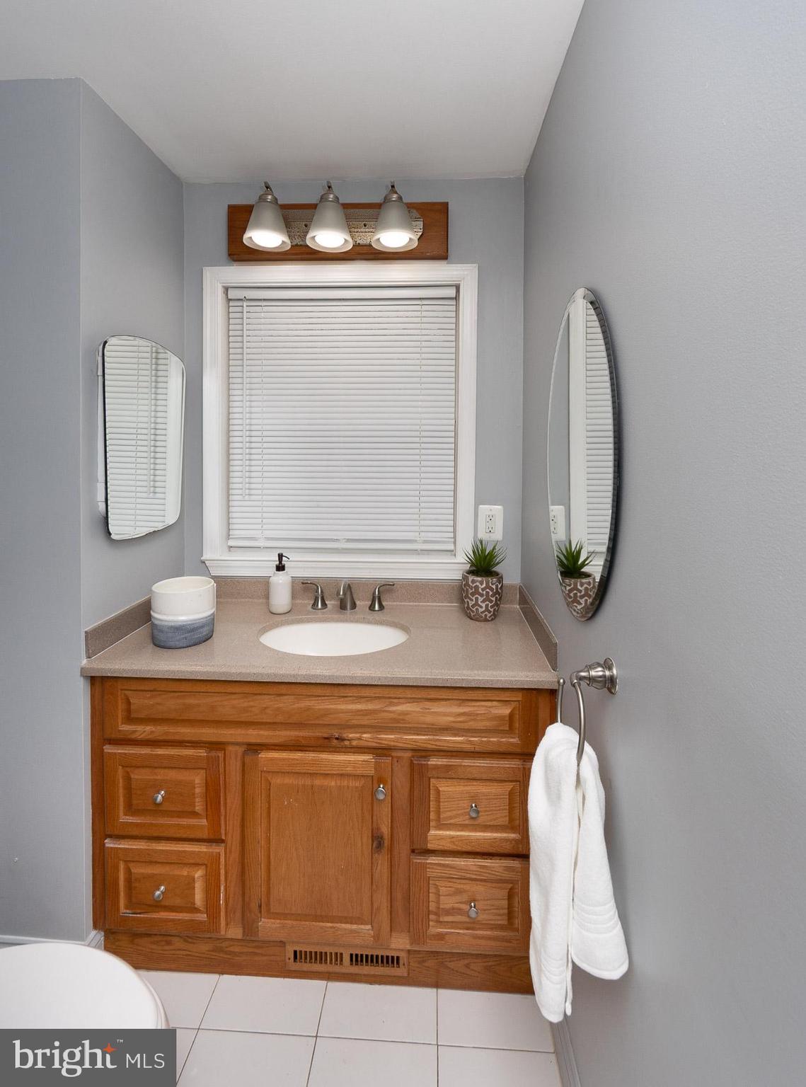 2011 Hanson Road Edgewood, MD 21040 - Photo 18 of 37 a bathroom with a sink and a mirror
