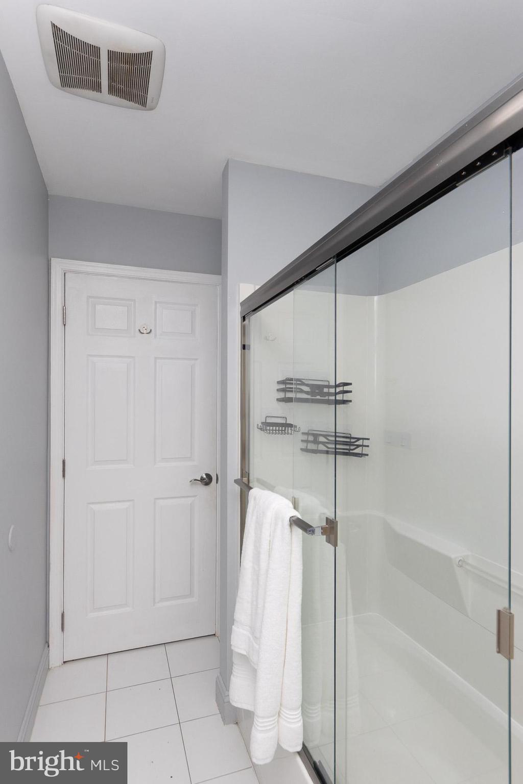 2011 Hanson Road Edgewood, MD 21040 - Photo 20 of 37 a bathroom with a shower and a glass door