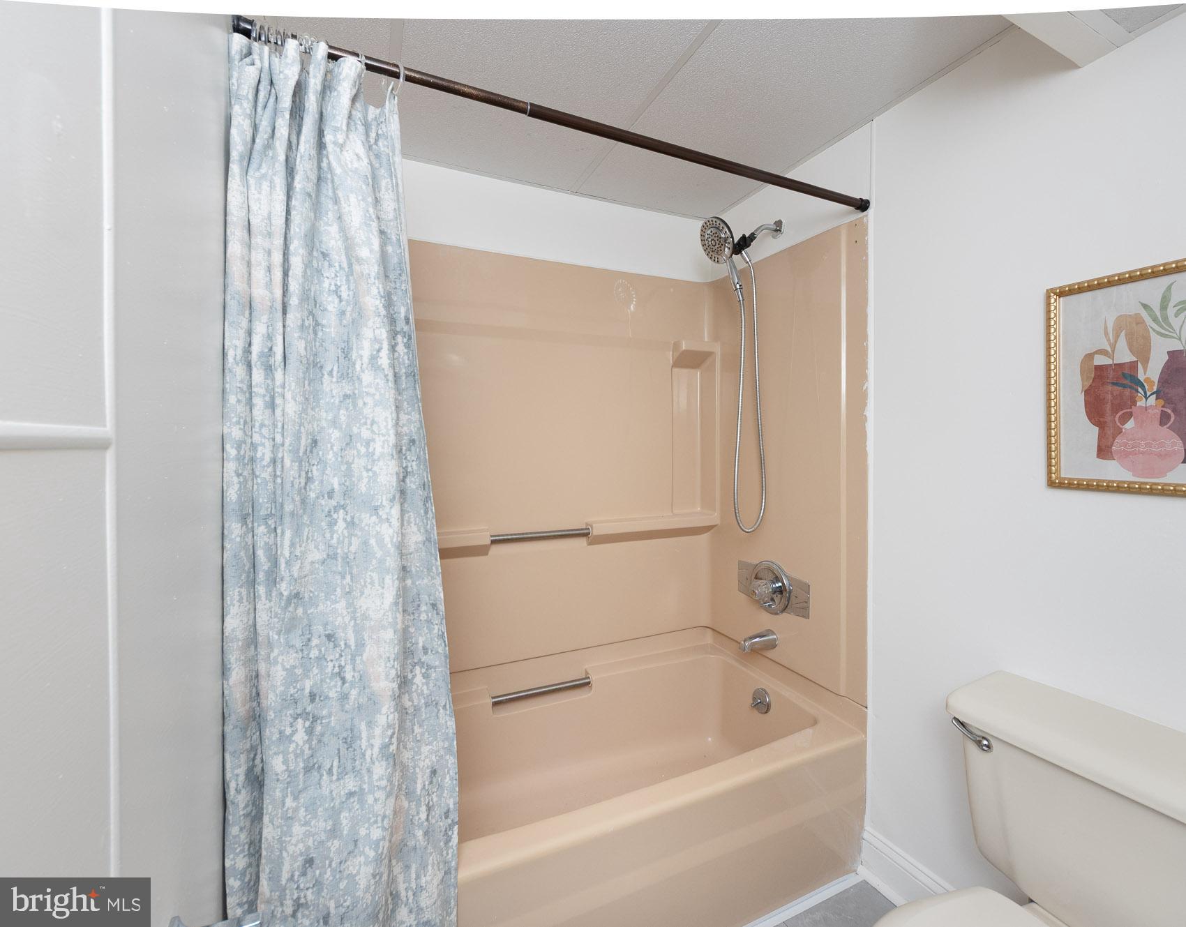 2011 Hanson Road Edgewood, MD 21040 - Photo 29 of 37 a bathroom with a bathtub and a shower