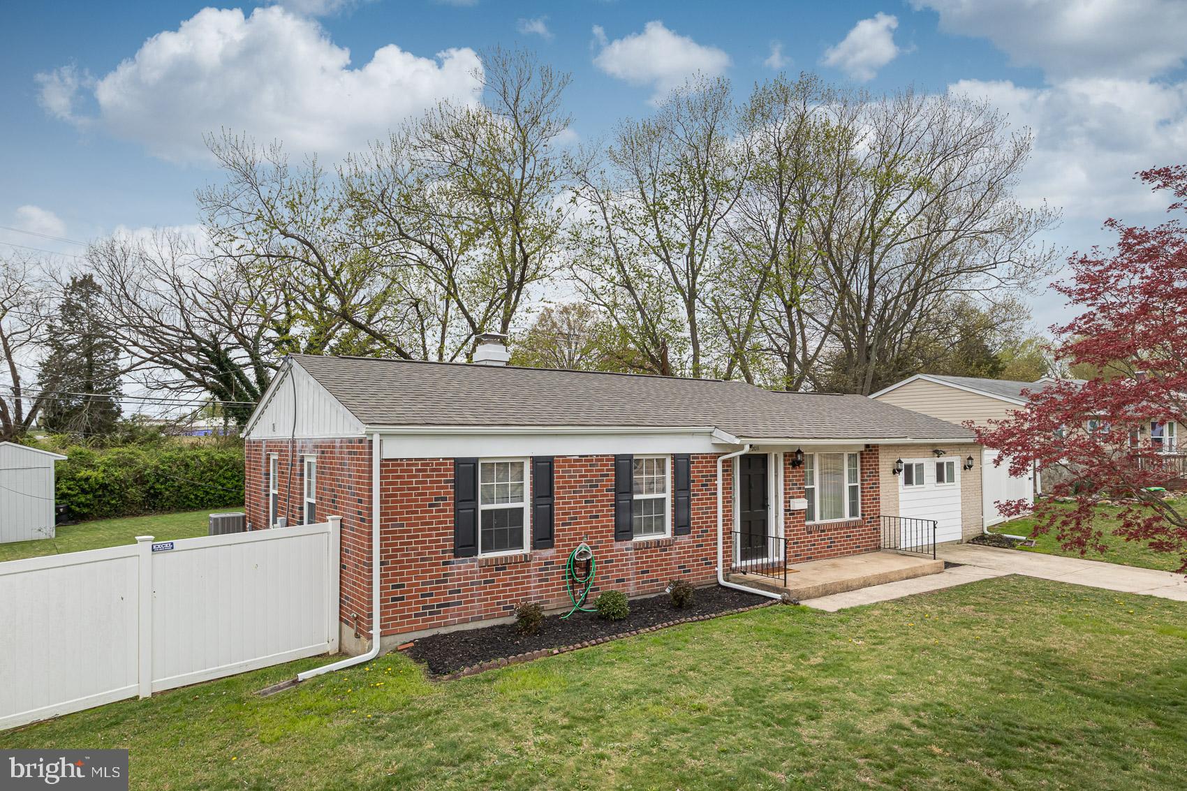 2011 Hanson Road Edgewood, MD 21040 - Photo 33 of 37 a front view of a house with a yard and porch