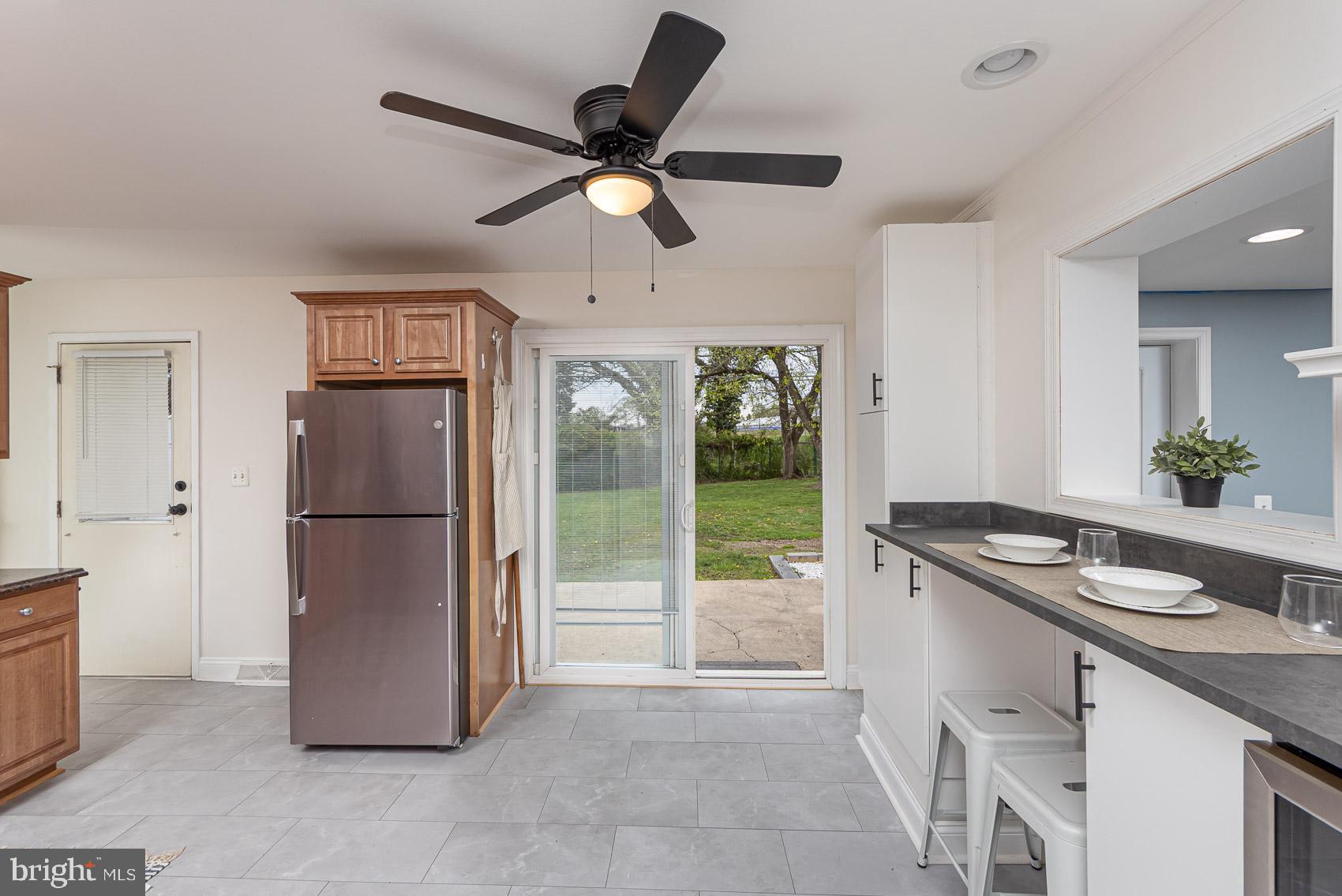 2011 Hanson Road Edgewood, MD 21040 - Photo 8 of 37 a kitchen with stainless steel appliances granite countertop a refrigerator a sink and a stove