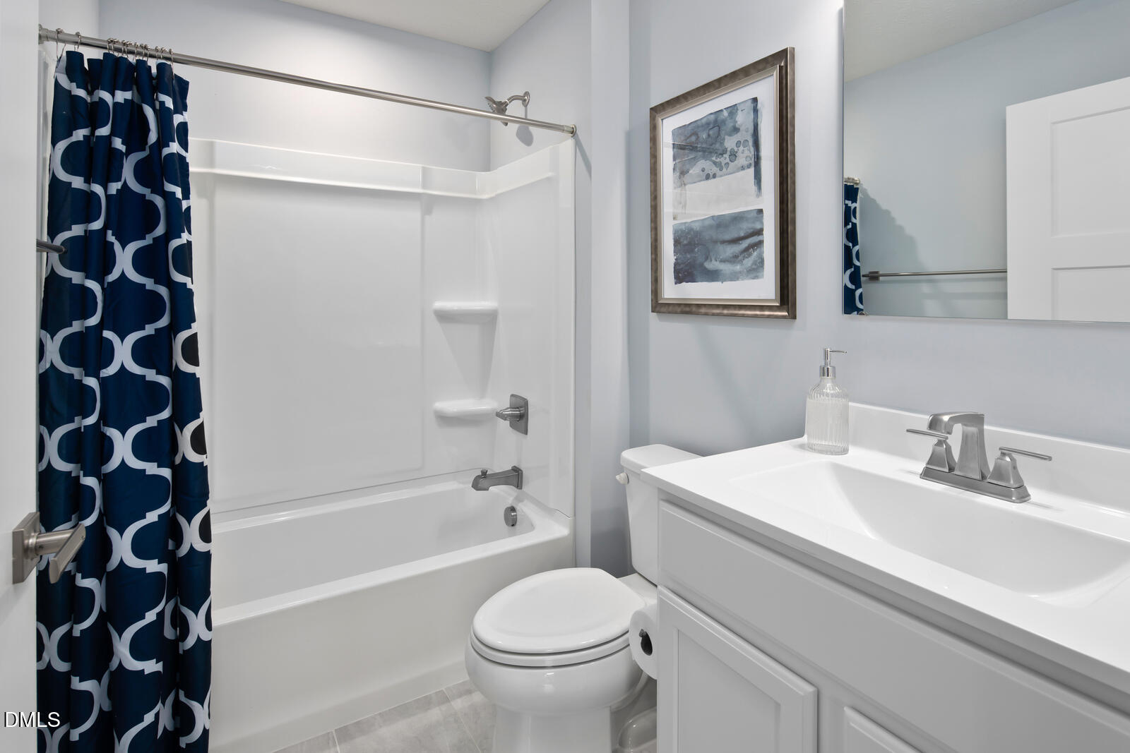 125 Springwood Lane Franklinton, NC 27525 - Photo 24 of 26 a bathroom with a sink toilet and shower