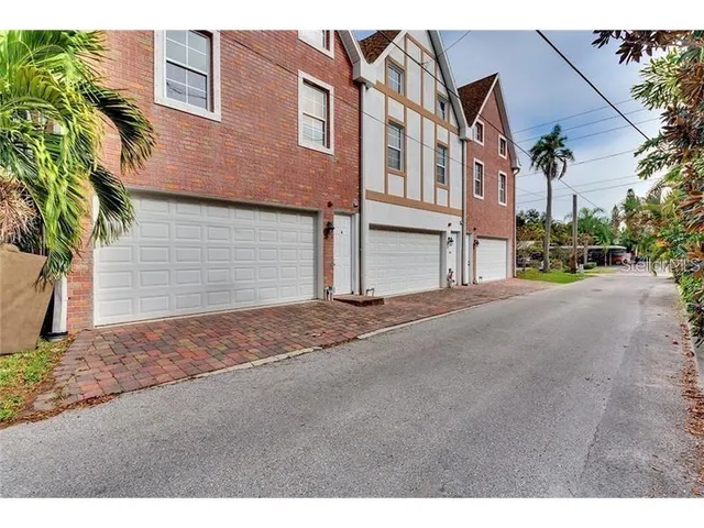 a view of a house with a street