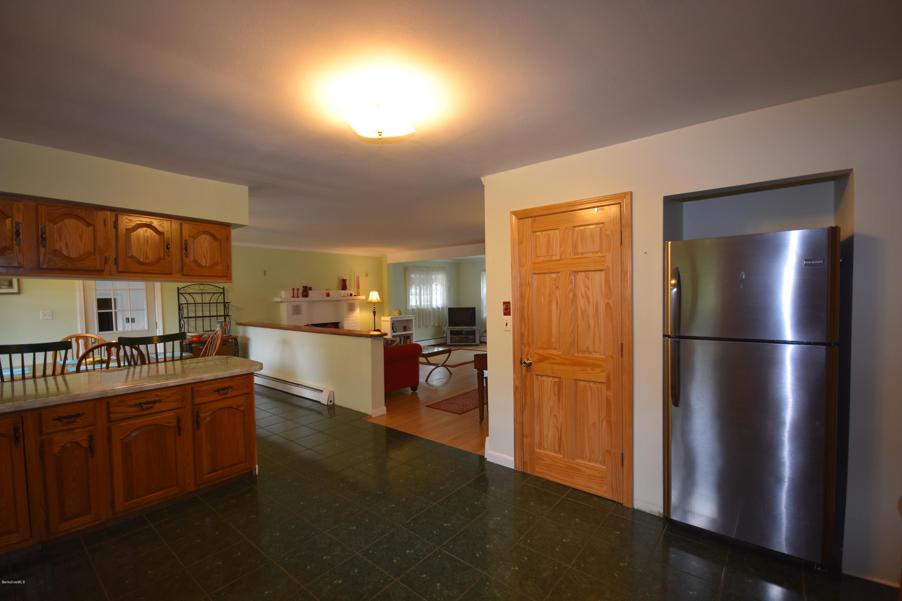 489 South Washington State Road Washington, MA 01223 - Photo 15 of 49 a kitchen with refrigerator and cabinets
