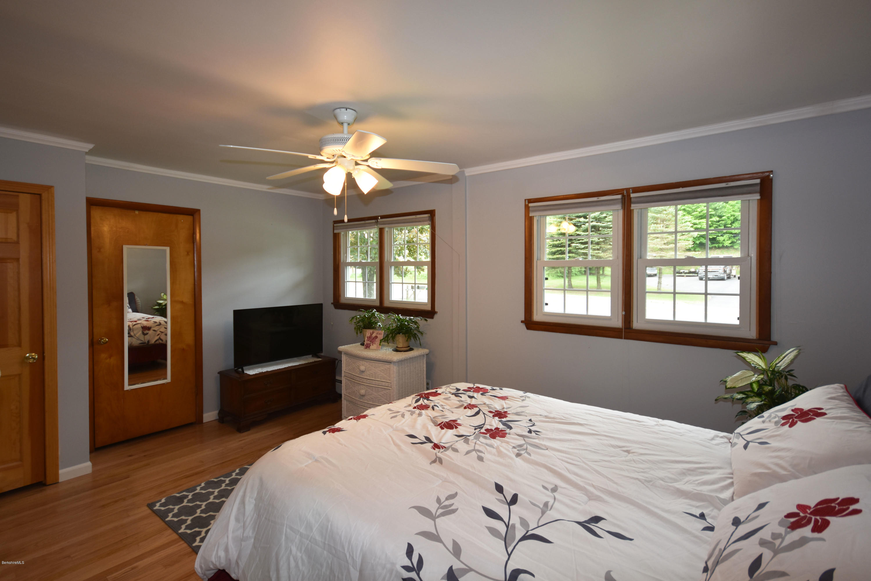 489 South Washington State Road Washington, MA 01223 - Photo 17 of 49 a bedroom with a bed and a flat screen tv