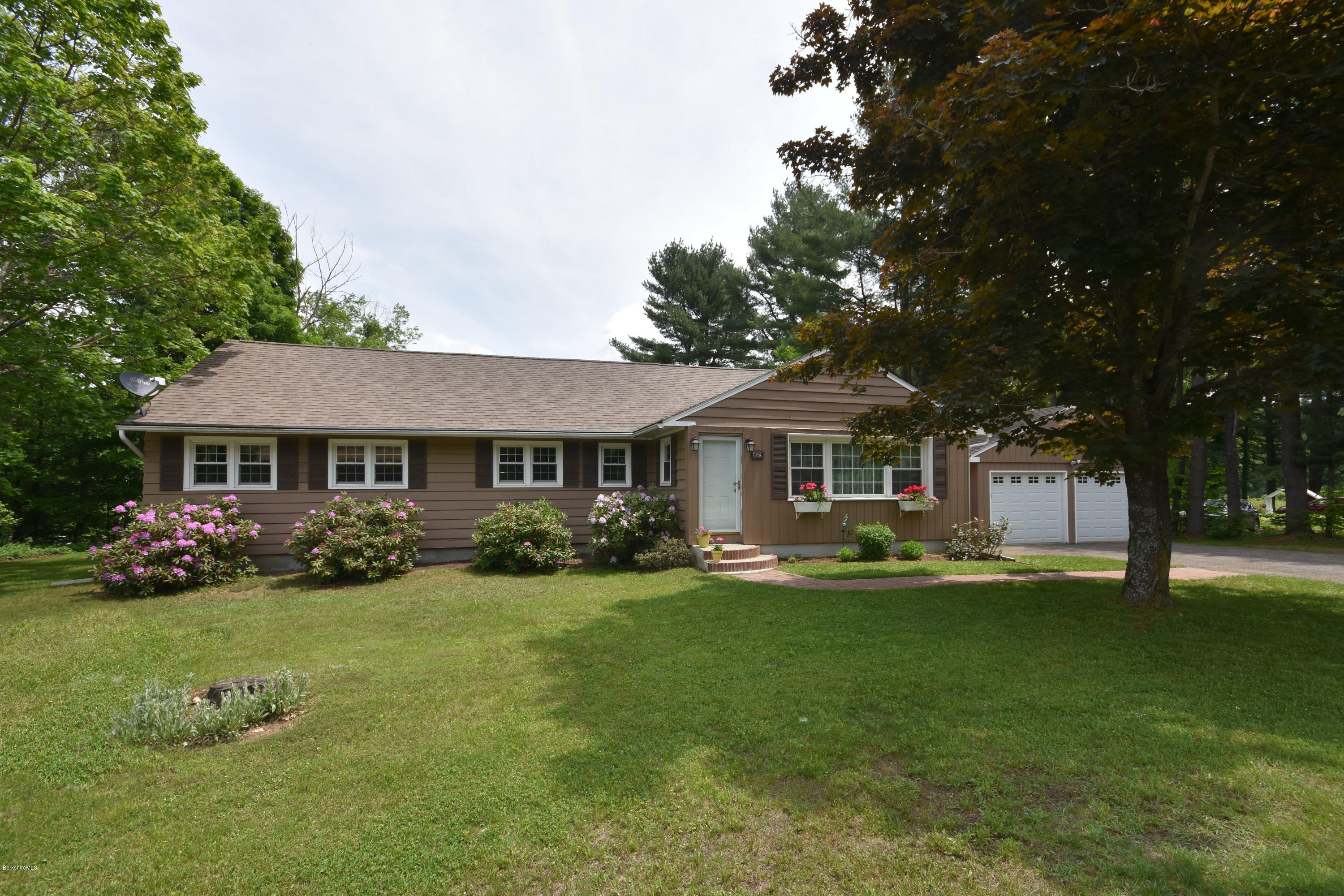 489 South Washington State Road Washington, MA 01223 - Photo 3 of 49 a front view of a house with garden