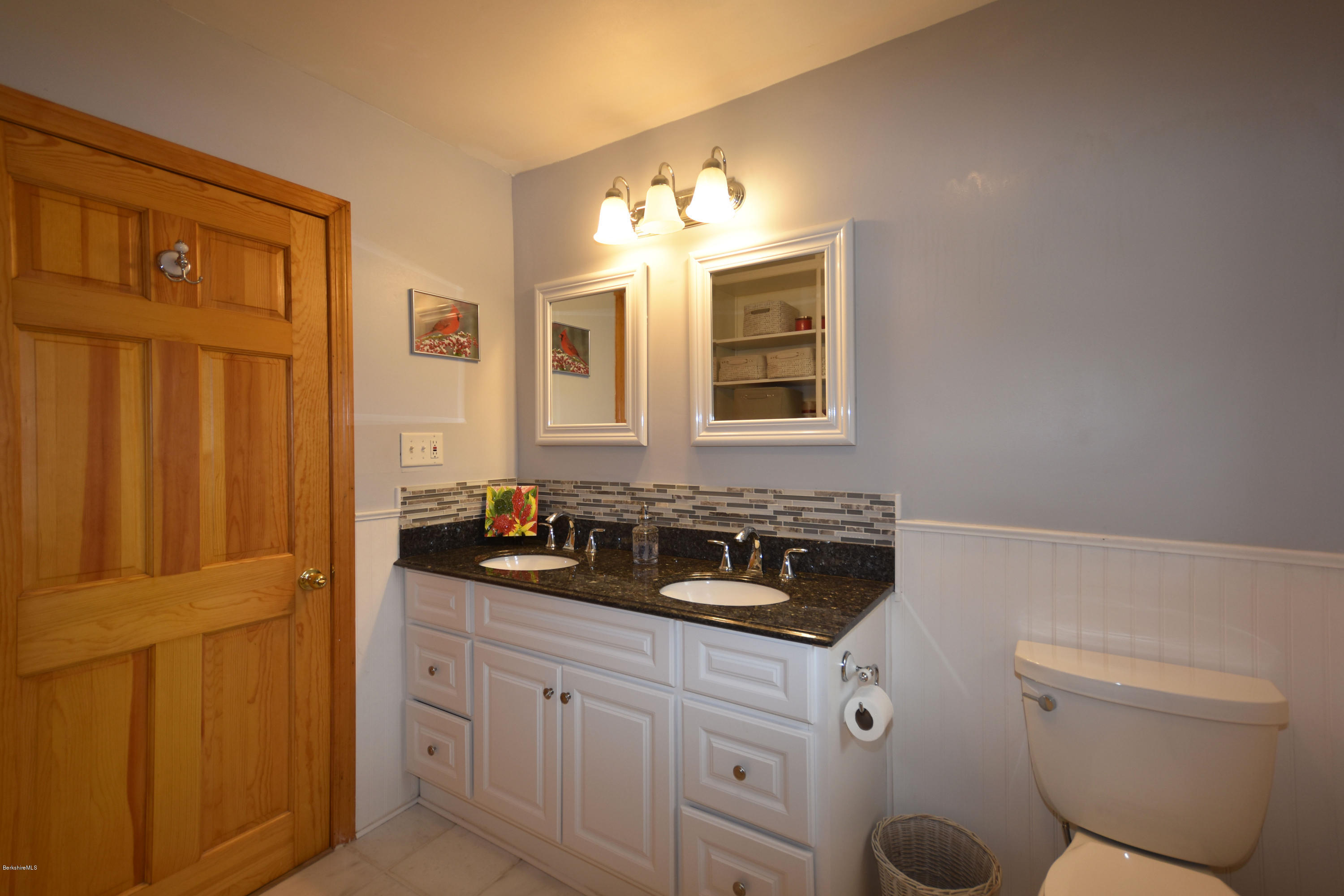 489 South Washington State Road Washington, MA 01223 - Photo 30 of 49 a bathroom with a sink a toilet and mirror