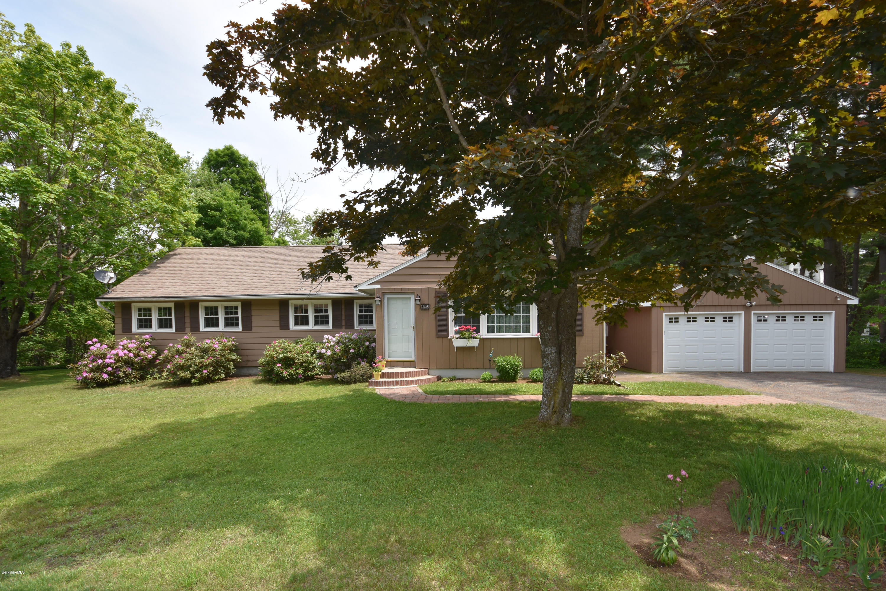 489 South Washington State Road Washington, MA 01223 - Photo 4 of 49 a front view of a house with garden