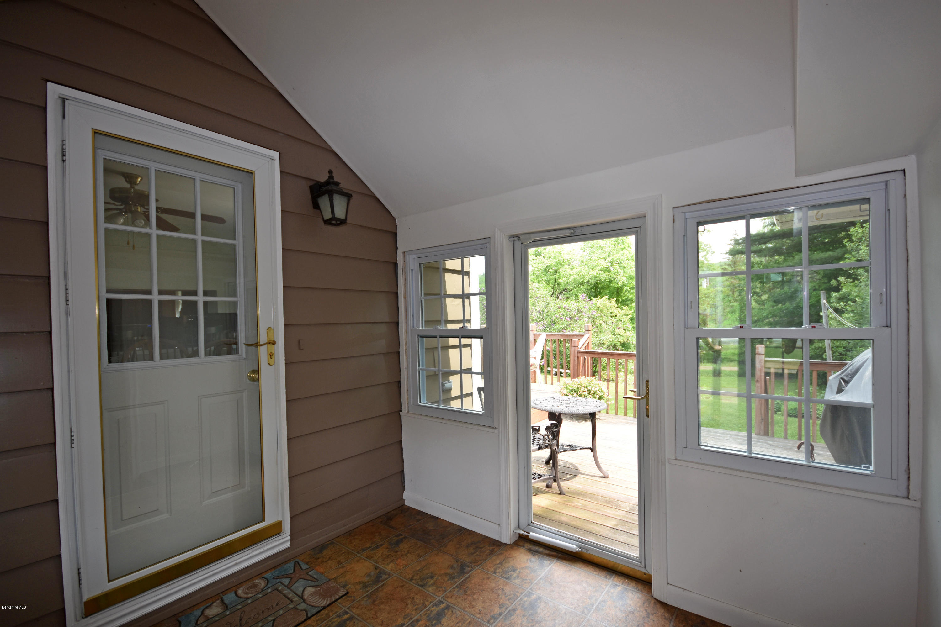 489 South Washington State Road Washington, MA 01223 - Photo 32 of 49 an empty room with wooden floor and windows