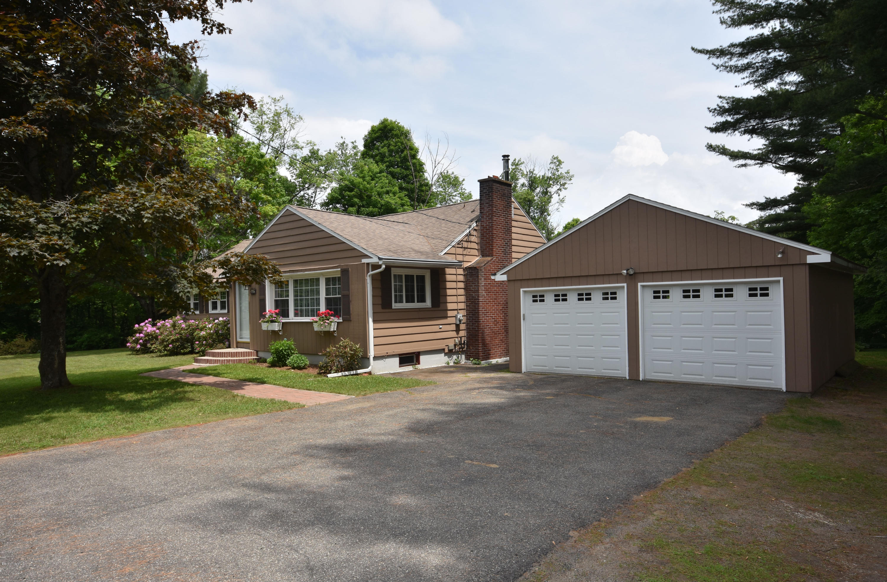 489 South Washington State Road Washington, MA 01223 - Photo 5 of 49 a front view of a house with garden