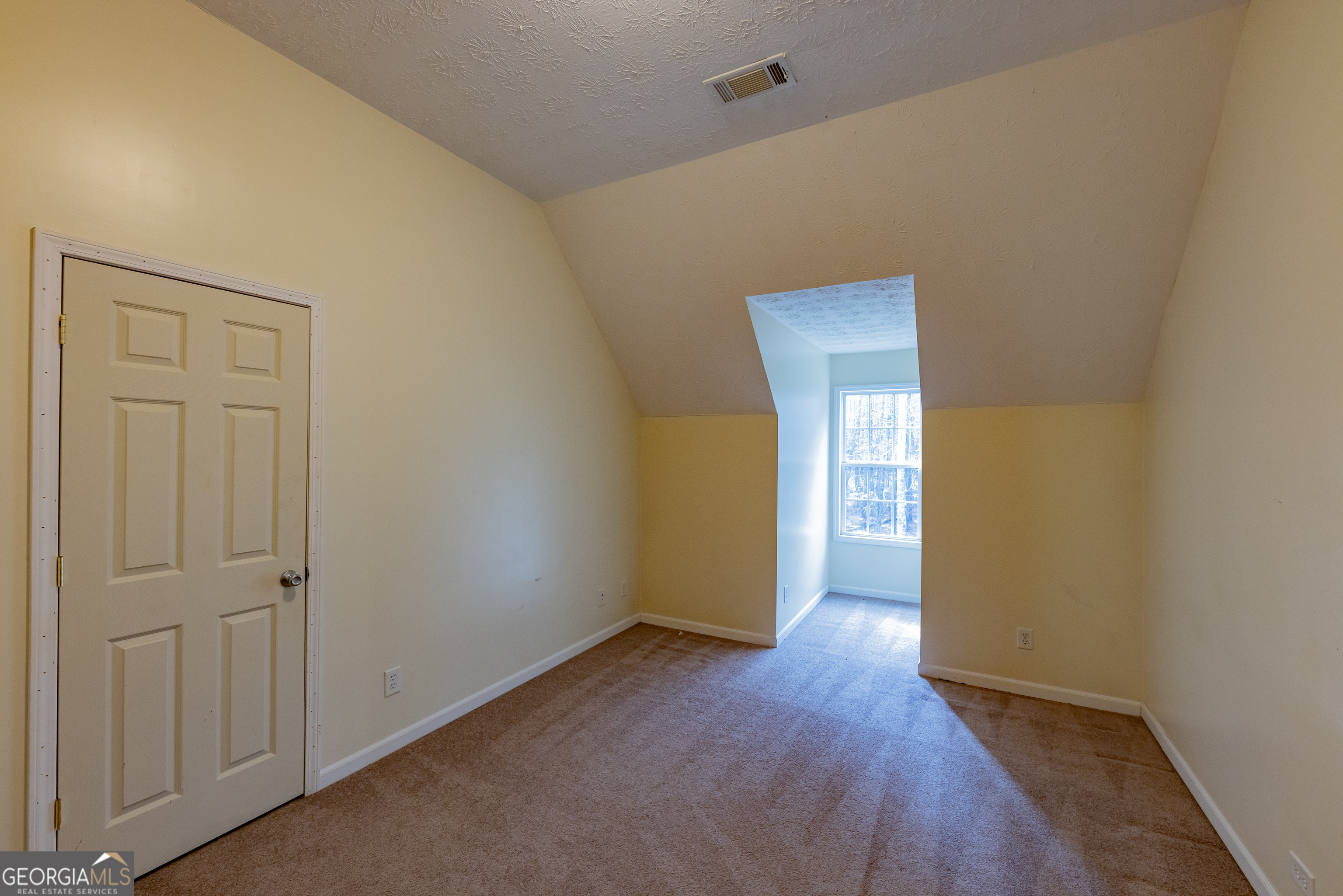 123 Rabbit Run Drive Meansville, GA 30256 - Photo 38 of 101 a view of an empty room