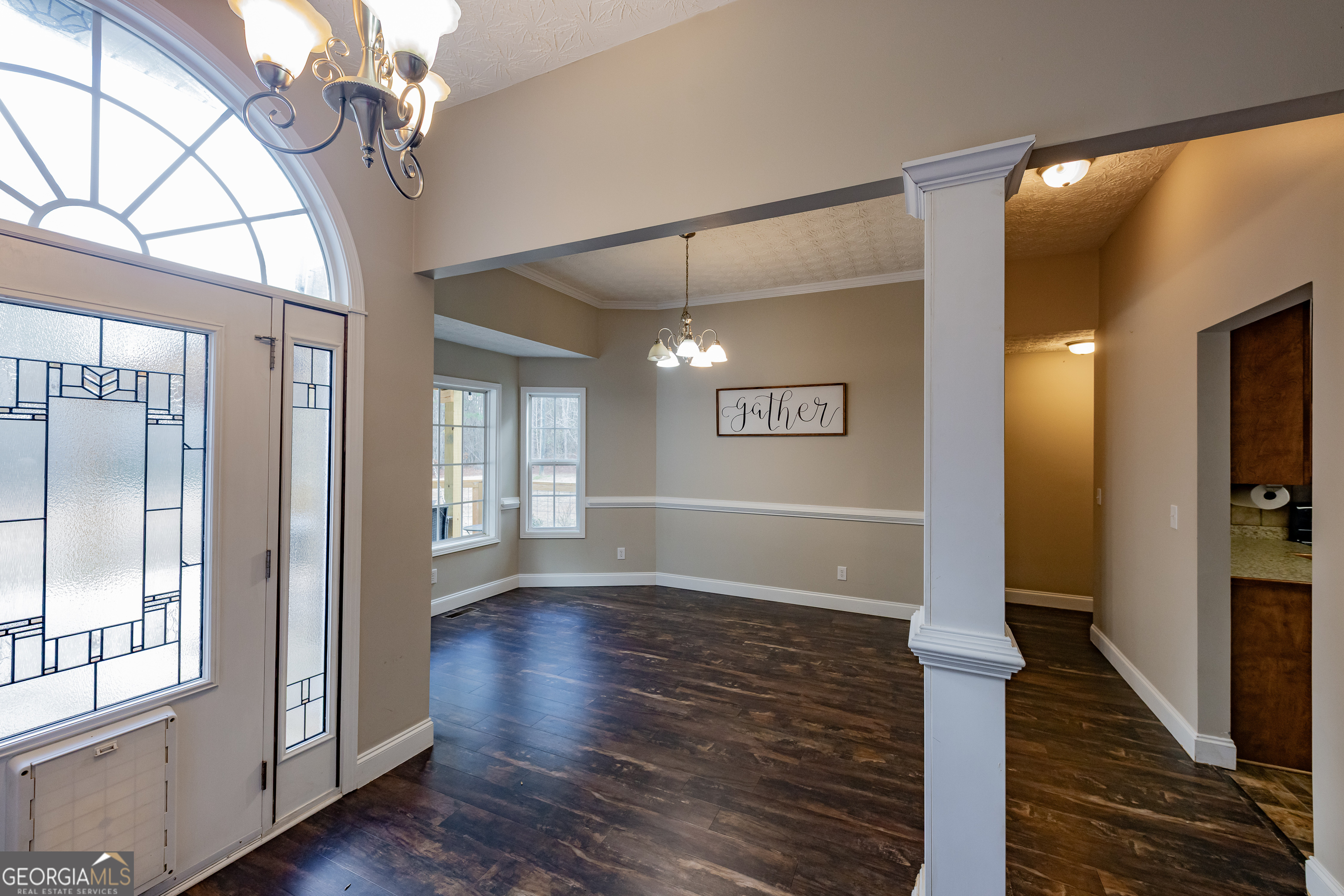 123 Rabbit Run Drive Meansville, GA 30256 - Photo 4 of 101 a view of livingroom with hardwood floor and hallway