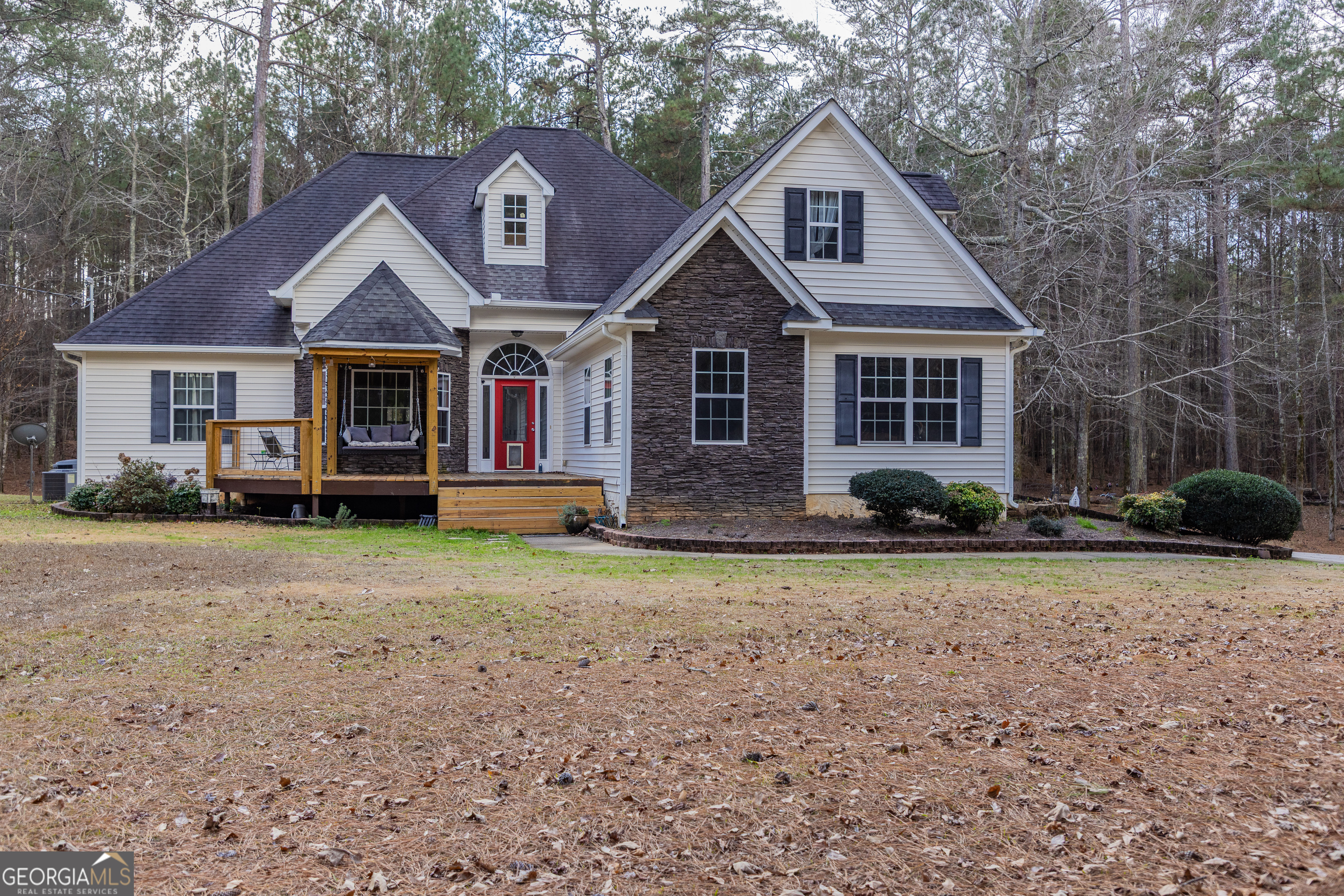 123 Rabbit Run Drive Meansville, GA 30256 - Photo 51 of 101 a front view of a house with a yard
