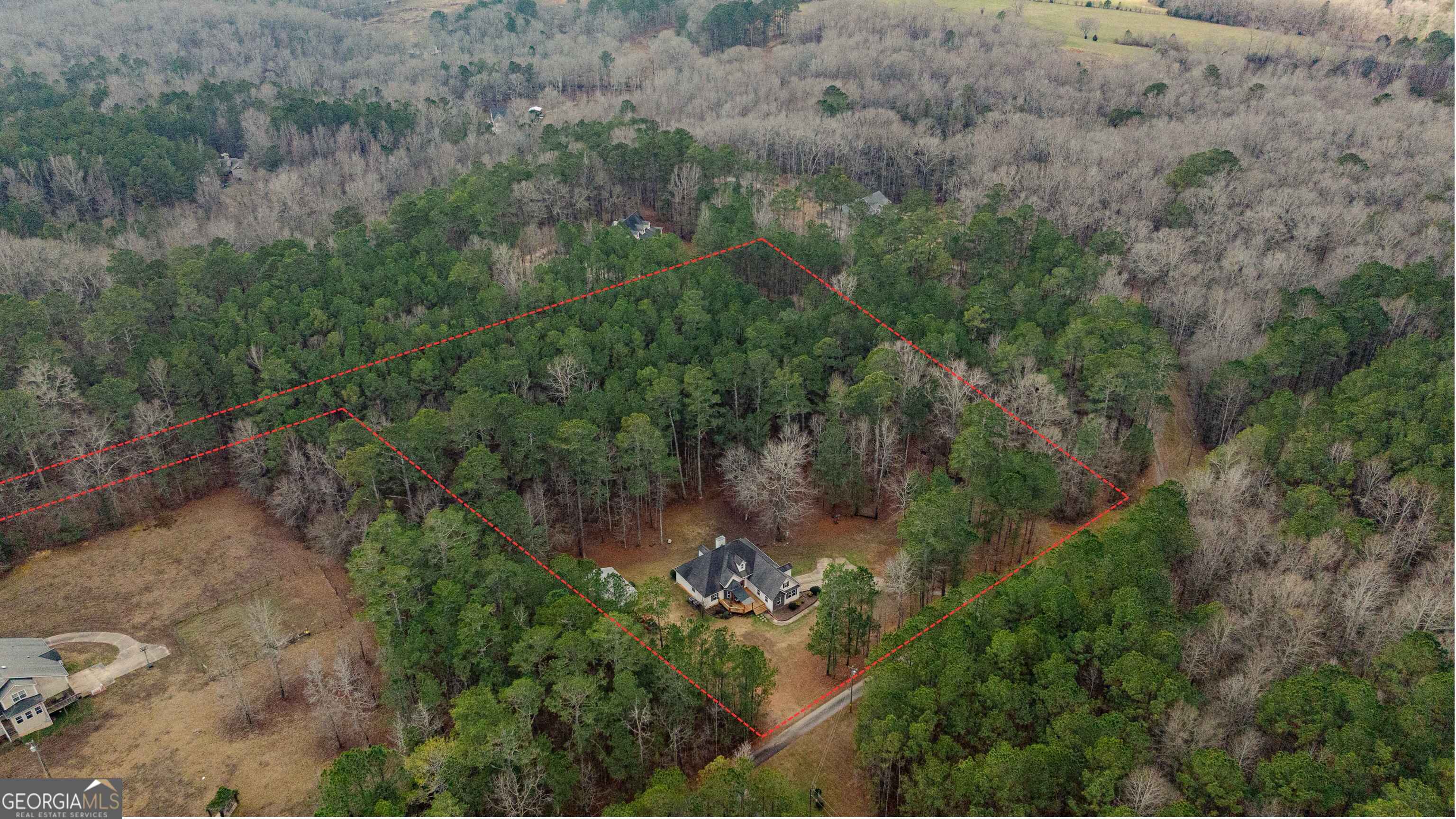 123 Rabbit Run Drive Meansville, GA 30256 - Photo 56 of 101 an aerial view of residential house with outdoor space and trees all around