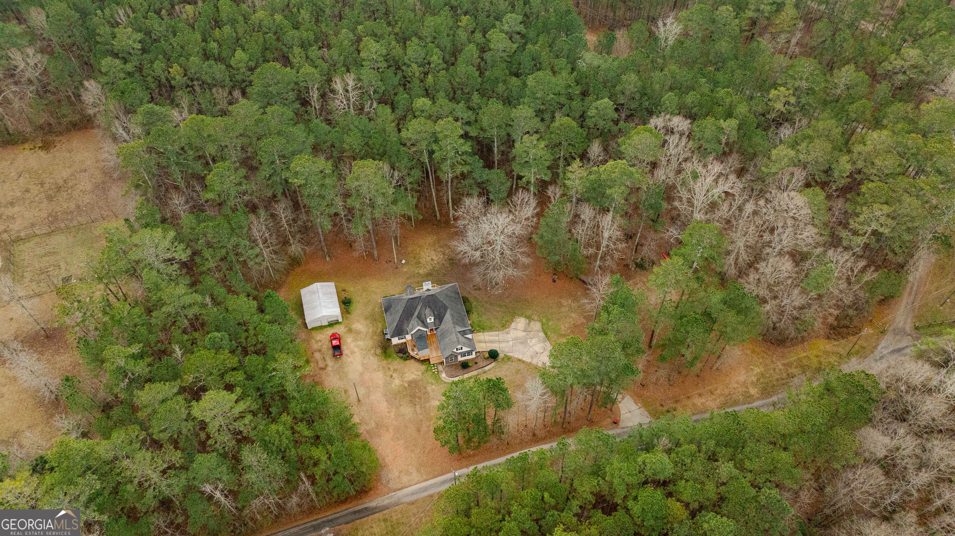 123 Rabbit Run Drive Meansville, GA 30256 - Photo 58 of 101 an aerial view of a house with a yard