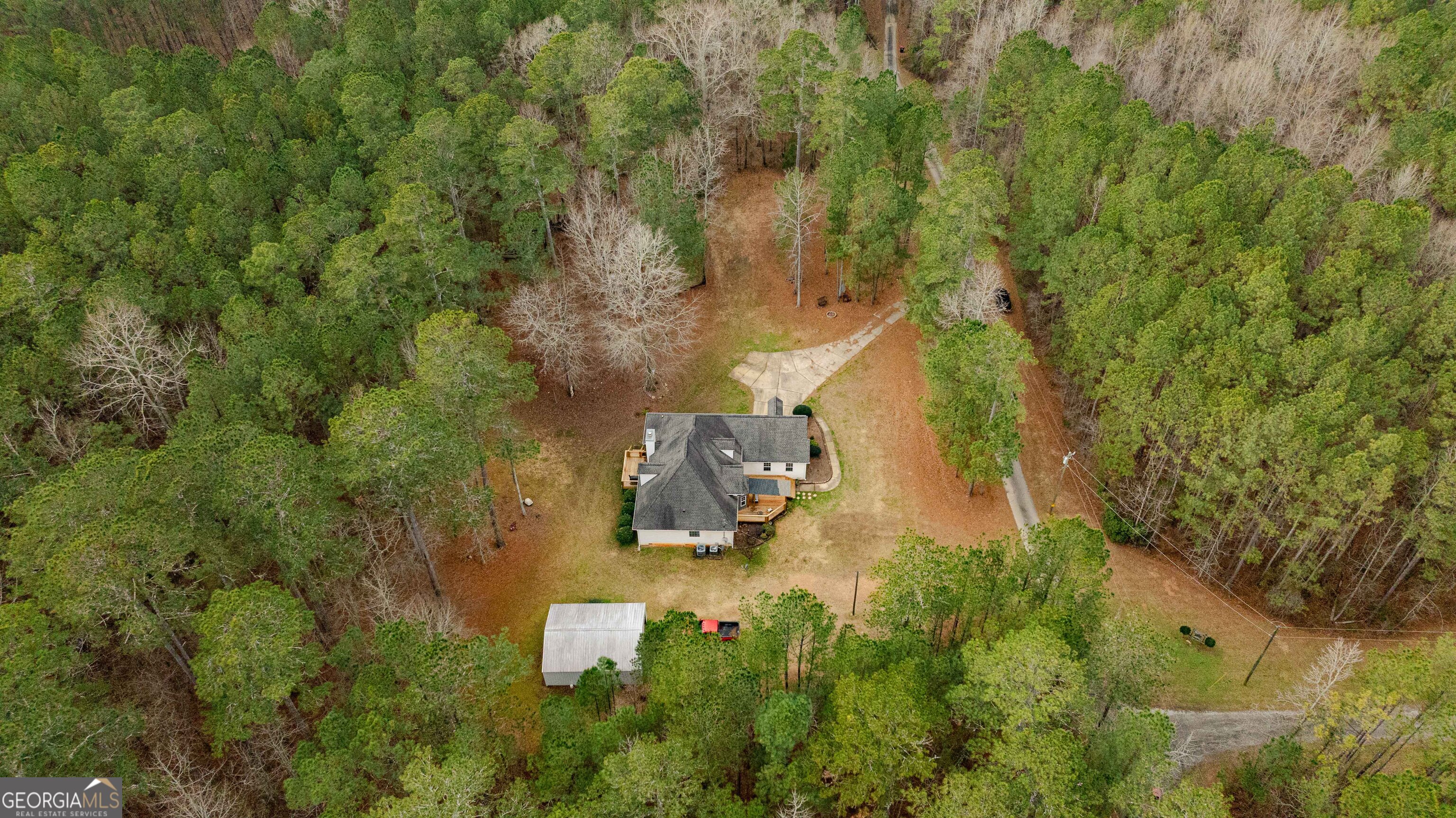 123 Rabbit Run Drive Meansville, GA 30256 - Photo 61 of 101 an aerial view of a house with a yard