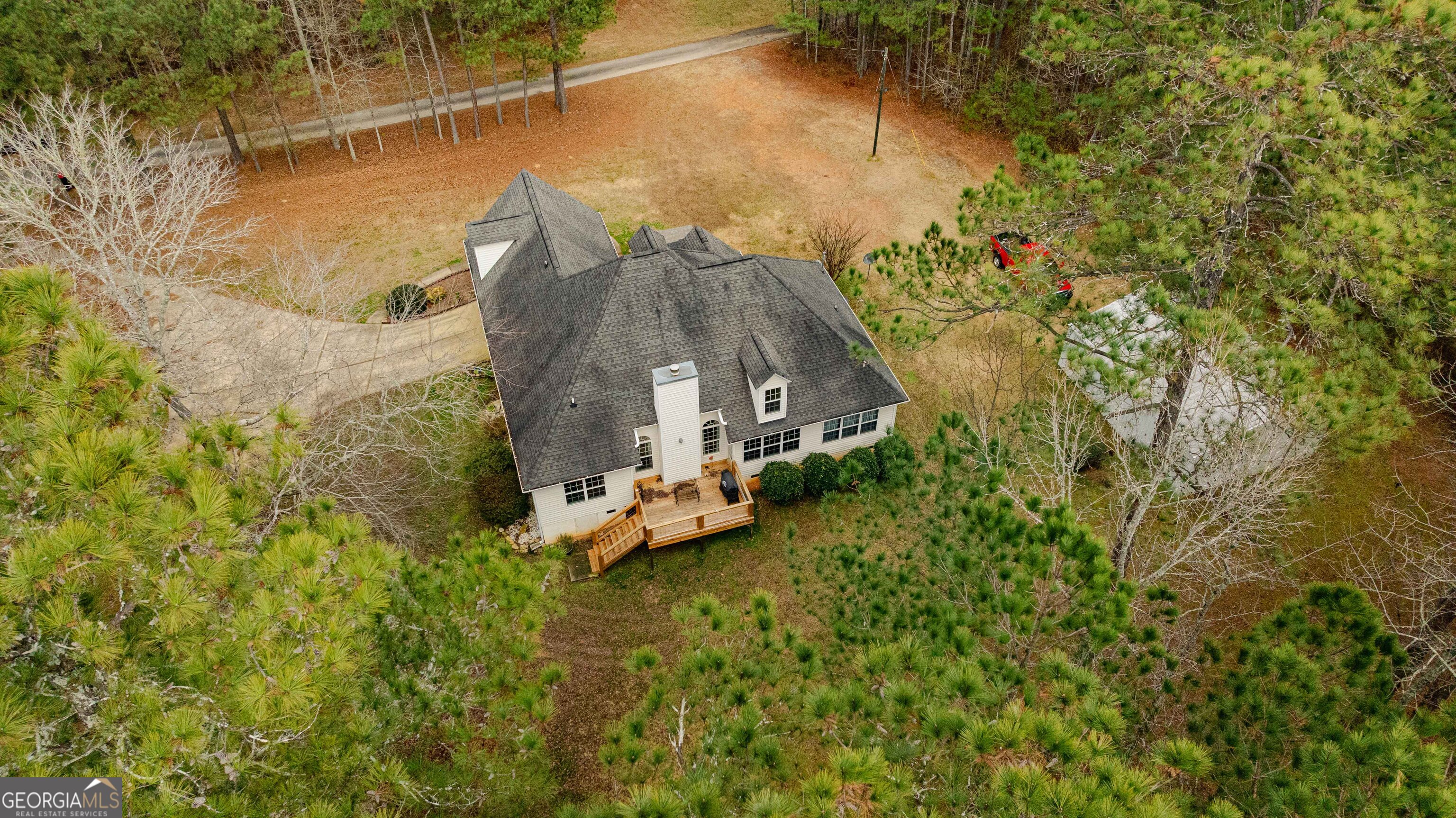 123 Rabbit Run Drive Meansville, GA 30256 - Photo 65 of 101 a view of a house with a yard