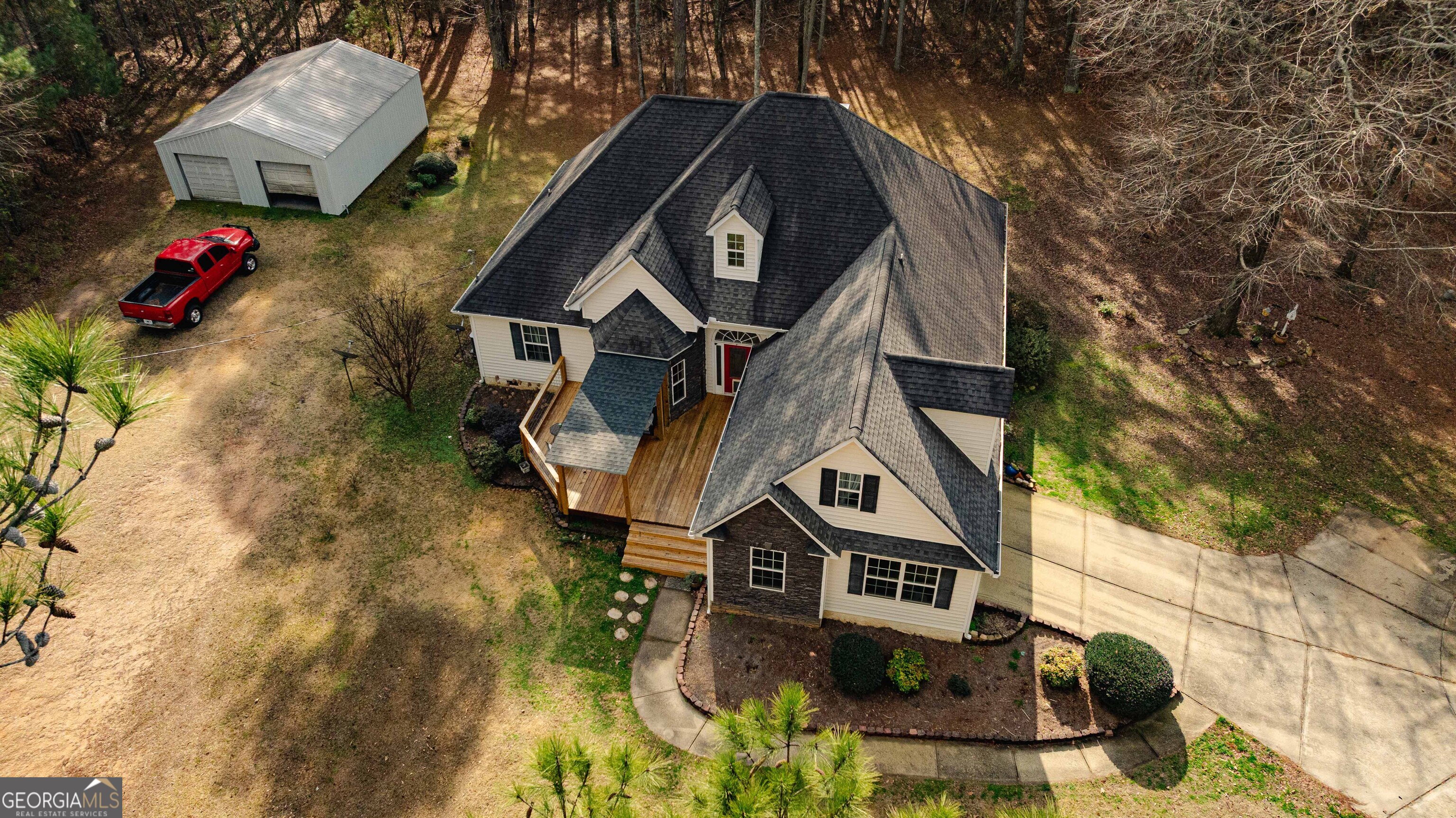 123 Rabbit Run Drive Meansville, GA 30256 - Photo 71 of 101 a front view of a house with a yard