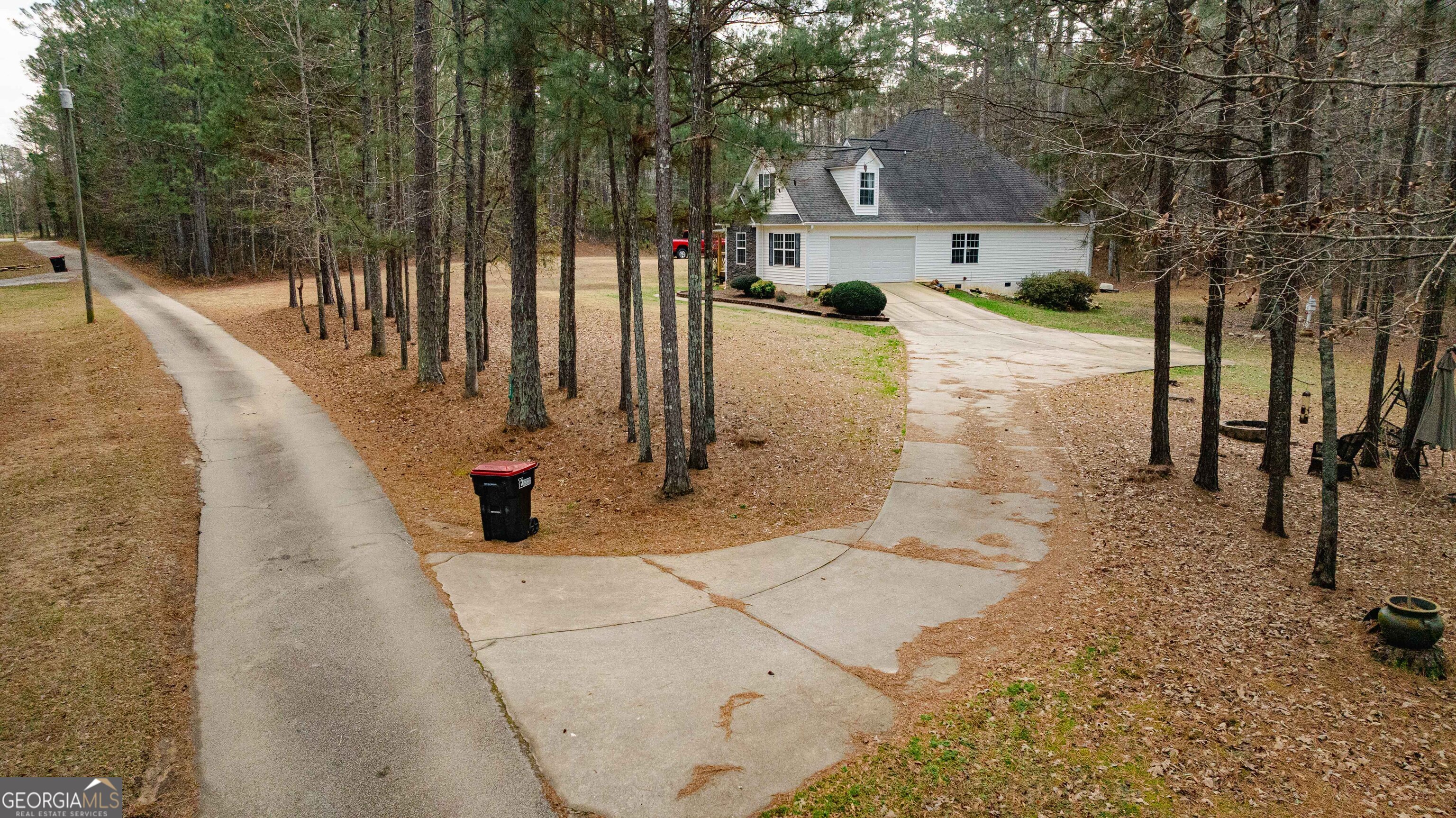123 Rabbit Run Drive Meansville, GA 30256 - Photo 78 of 101 a view of a yard with wooden fence